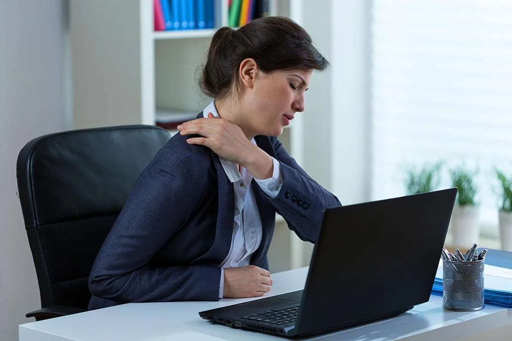Why do I have shoulder pain from sitting at a desk?